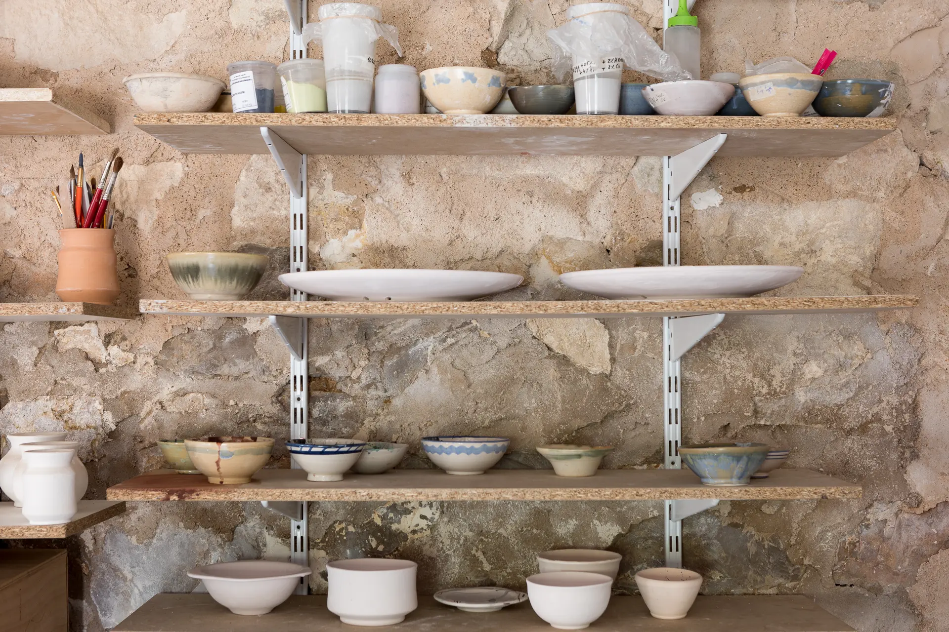 Proyecto y reforma de vivienda - taller de alfarería en Muel